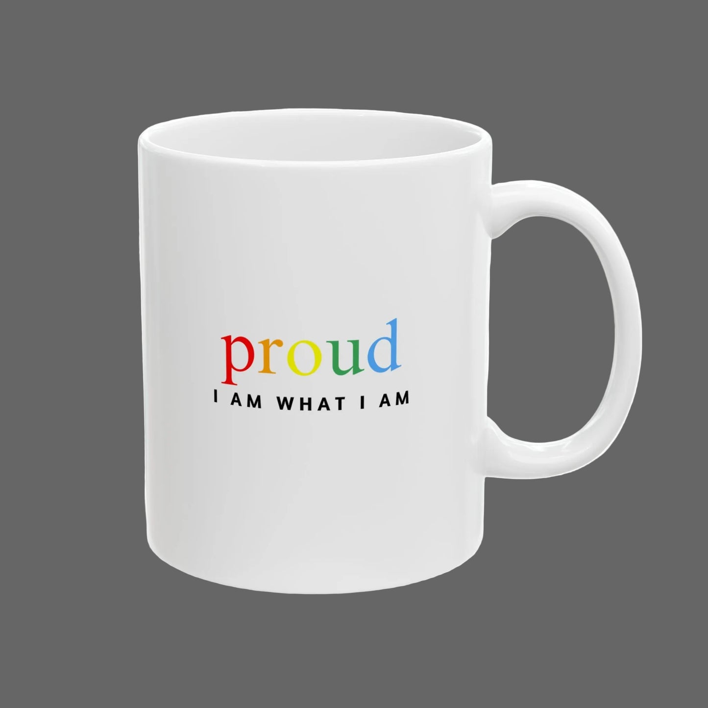White mug with colorful text 'proud I AM WHAT I AM' on a white background