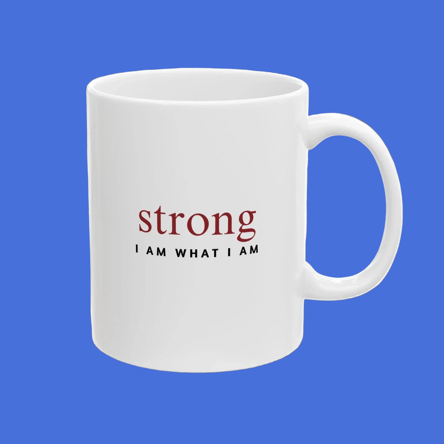 White mug with motivational quote 'strong I AM WHAT I AM' on a white background