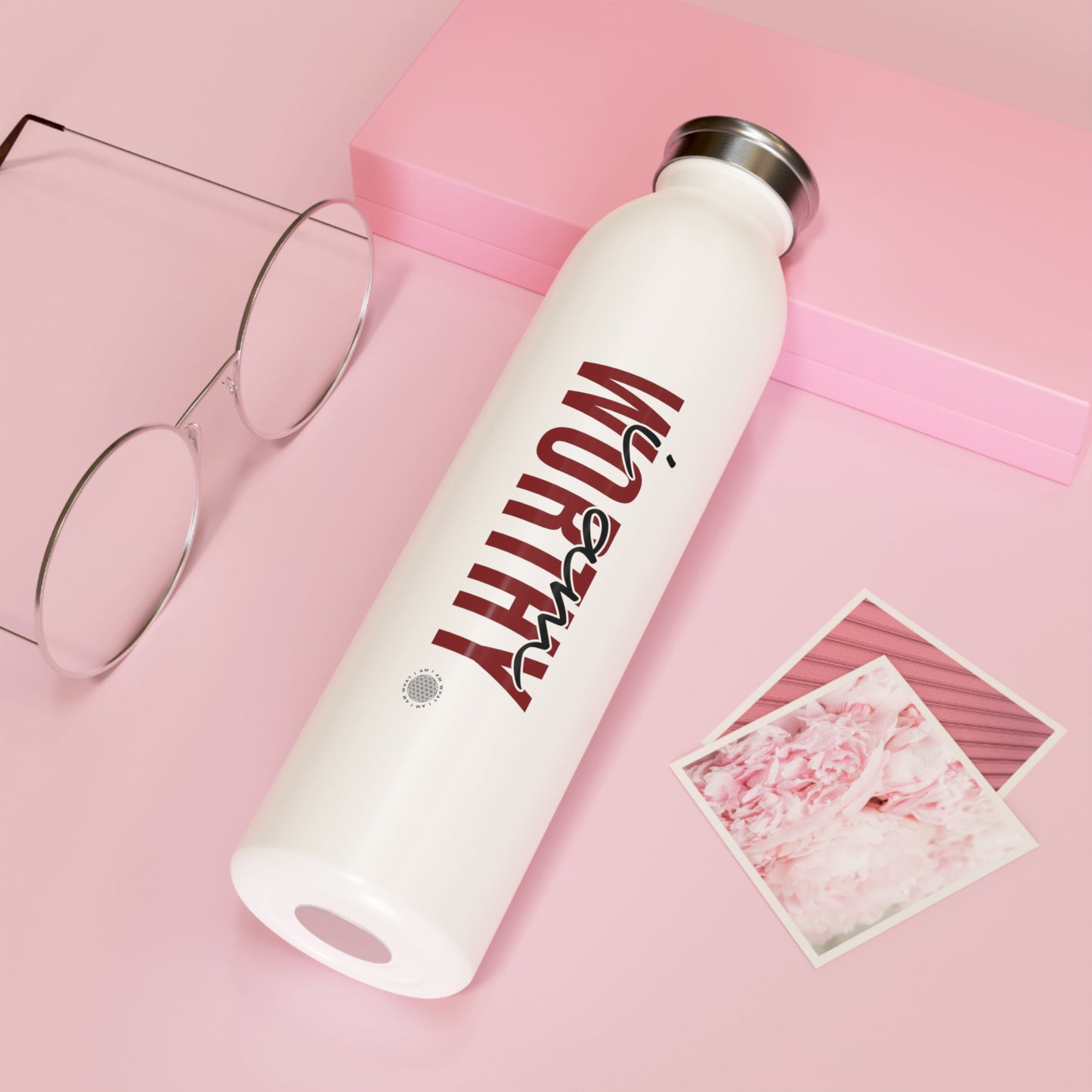 Our I Am Worthy Slim Water Bottle is the perfect way to stay hydrated on the go. This sleek and stylish bottle is made from durable stainless steel and features a double-walled vacuum insulation to keep your drinks cold for up to 24 hours.