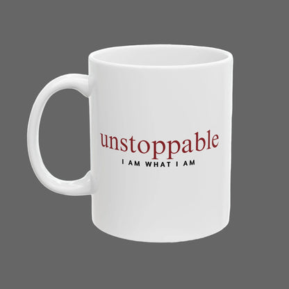 White mug with 'unstoppable I AM WHAT I AM' text on a white background