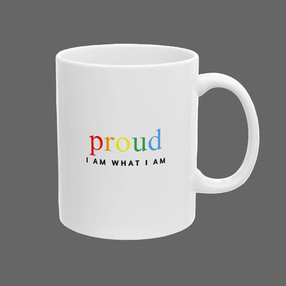 White mug with colorful text 'proud I AM WHAT I AM' on a white background