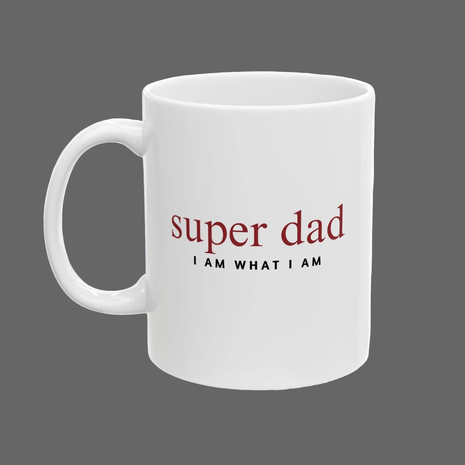 White mug with 'super dad I AM WHAT I AM' text on a white background