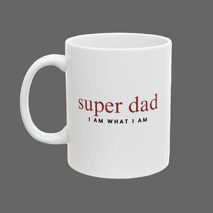White mug with 'super dad I AM WHAT I AM' text on a white background