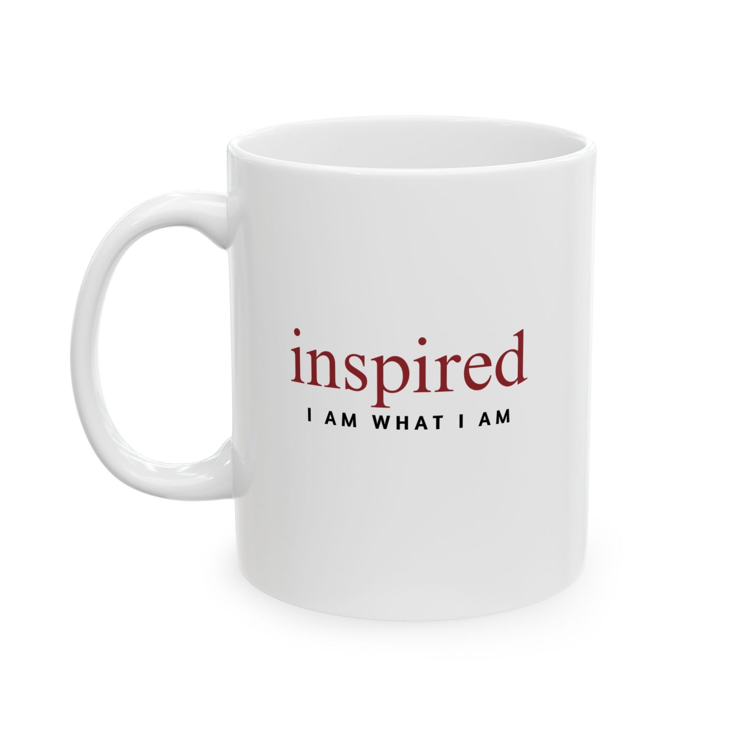 White mug with 'inspired I AM WHAT I AM' text on a white background
