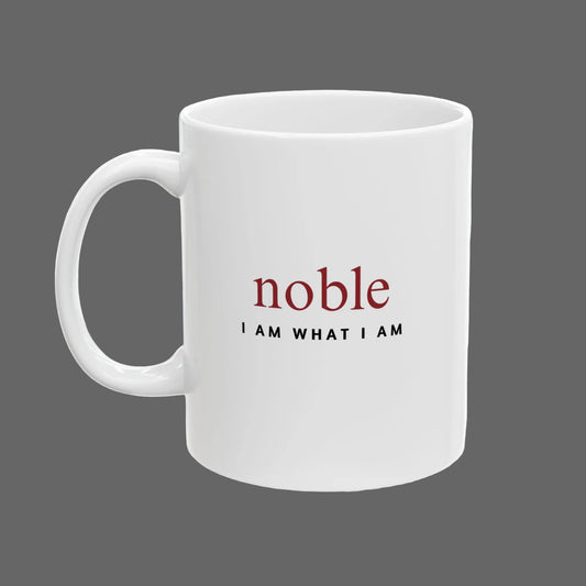 White mug with 'noble I AM WHAT I AM' text on a white background