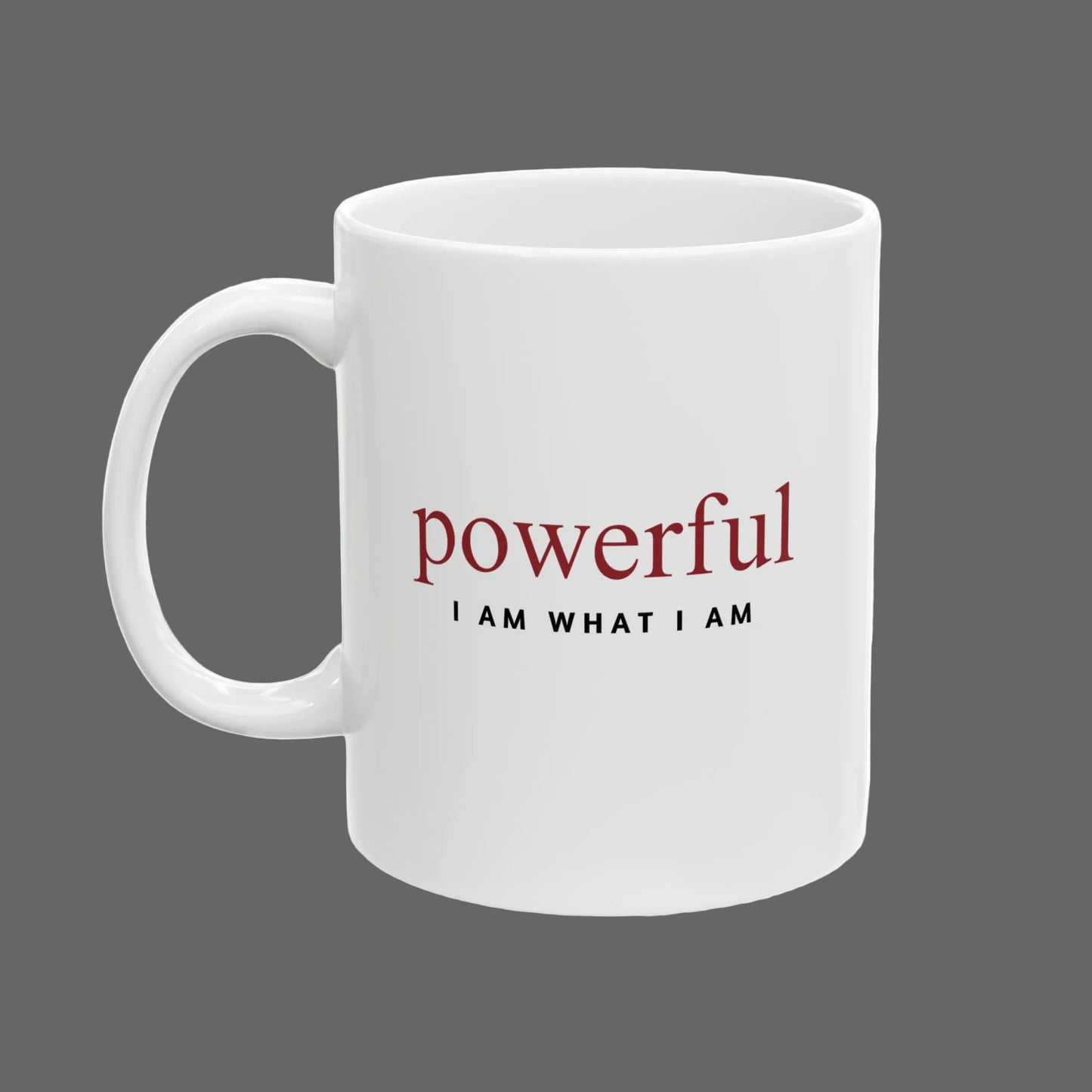White mug with motivational text 'powerful I AM WHAT I AM' on a white background