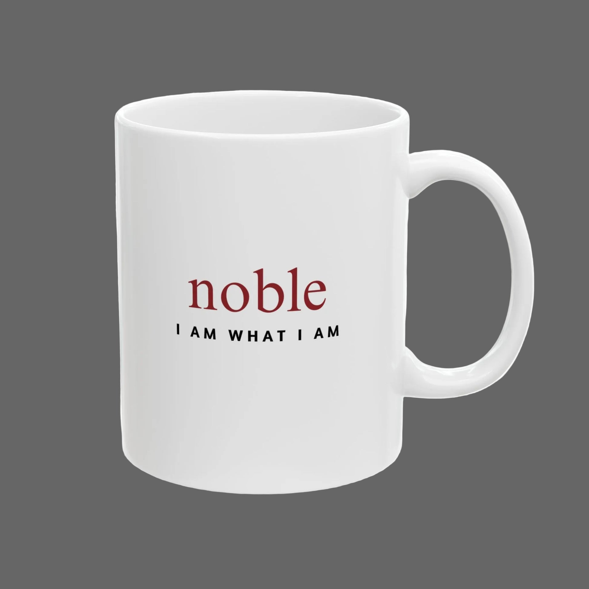 White mug with 'noble I AM WHAT I AM' text on a white background