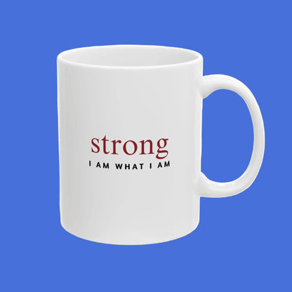 White mug with motivational quote 'strong I AM WHAT I AM' on a white background