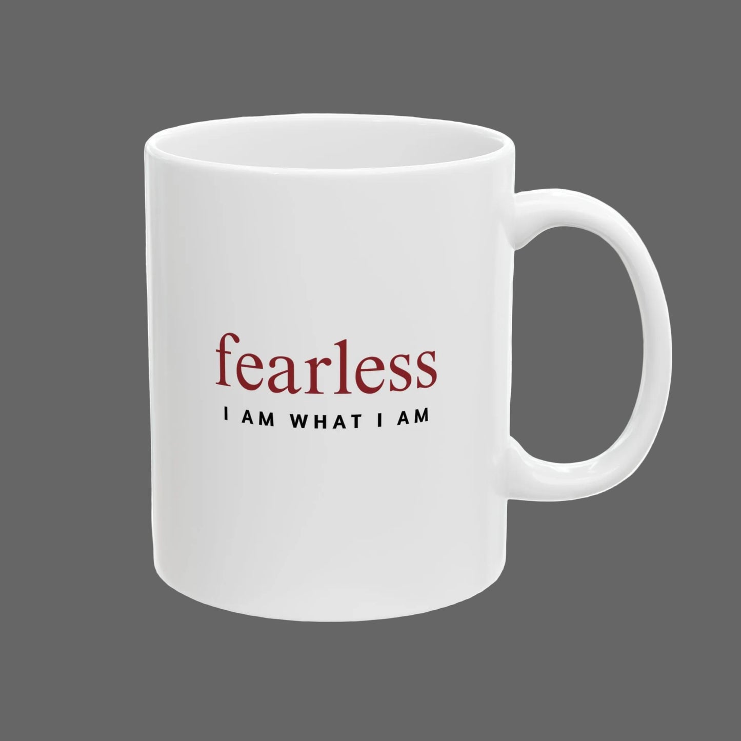 White mug with 'fearless I AM WHAT I AM' text on a white background