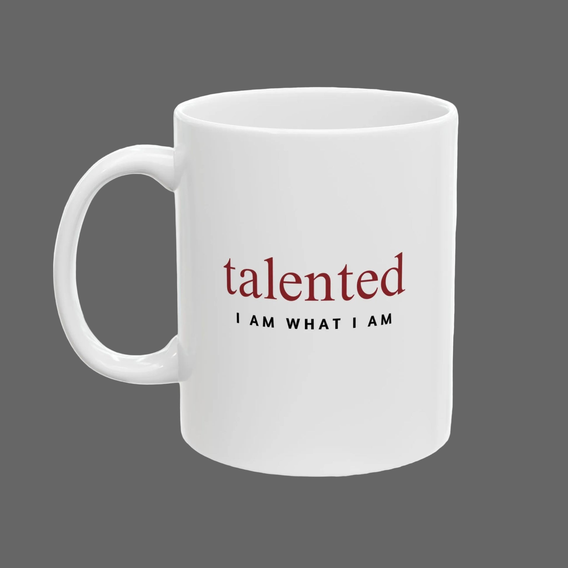 White mug with motivational quote 'talented I AM WHAT I AM' on a white background