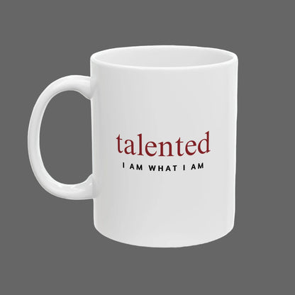 White mug with motivational quote 'talented I AM WHAT I AM' on a white background