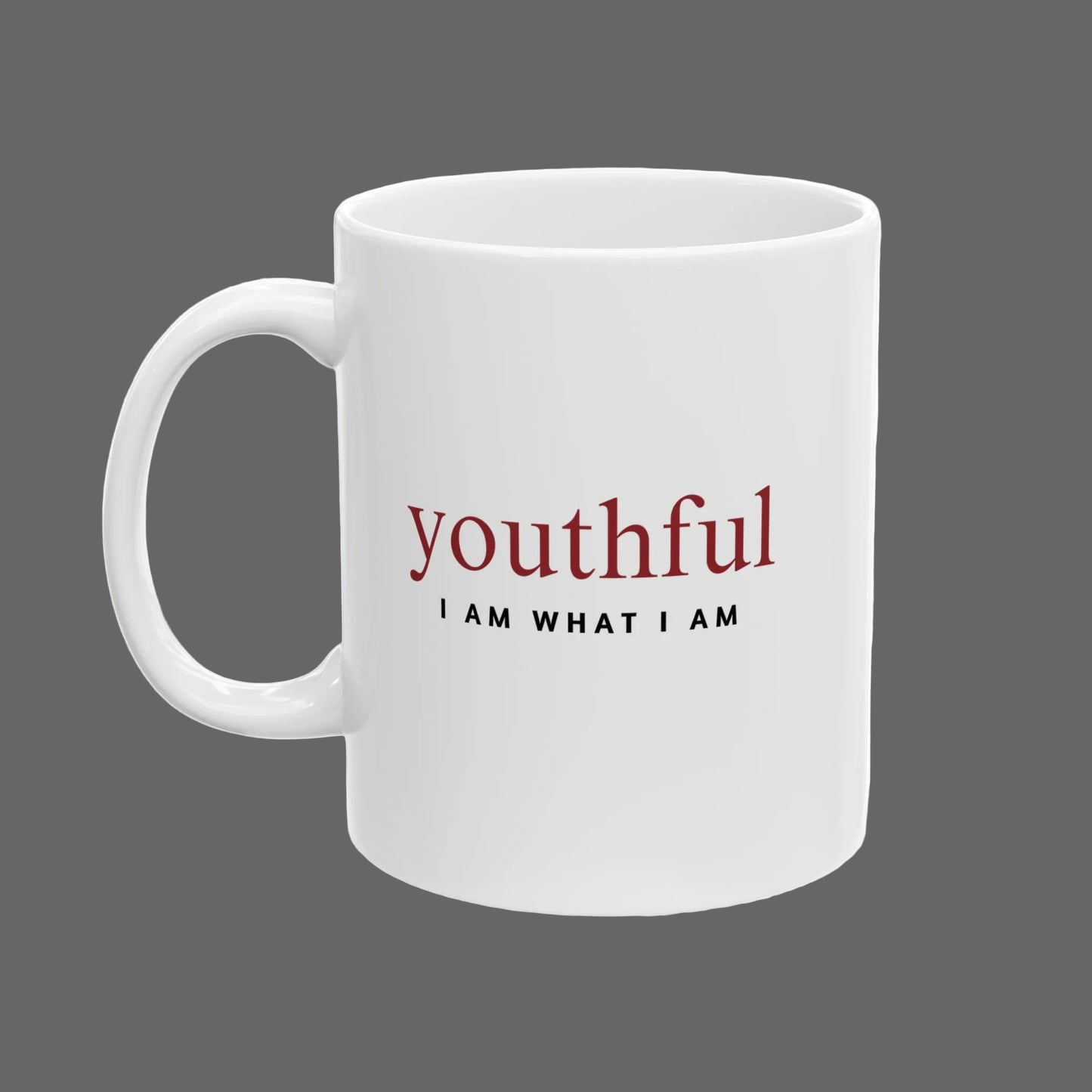 White mug with 'youthful I AM WHAT I AM' text on a white background