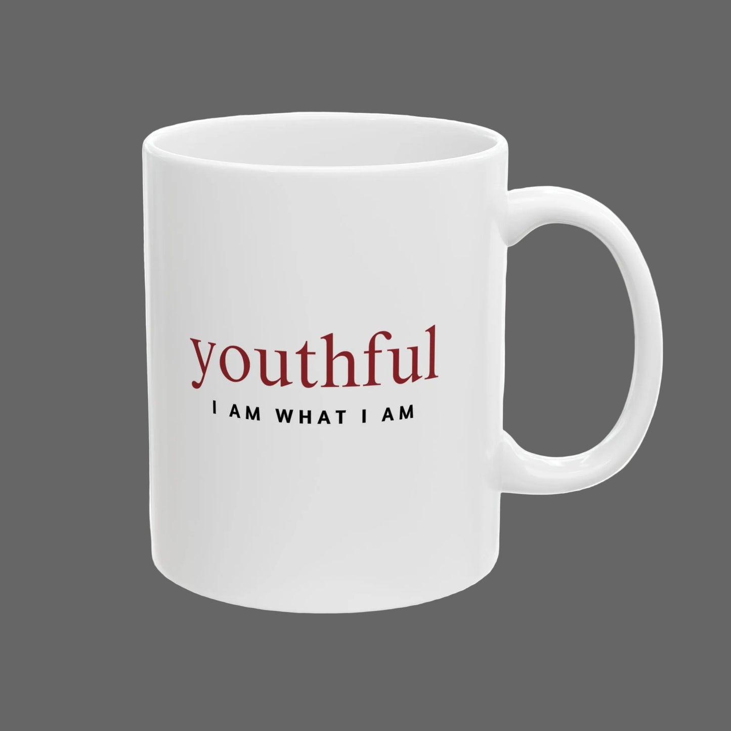 White mug with red and black text on a white background