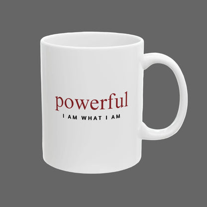 White mug with motivational text 'powerful I AM WHAT I AM' on a white background