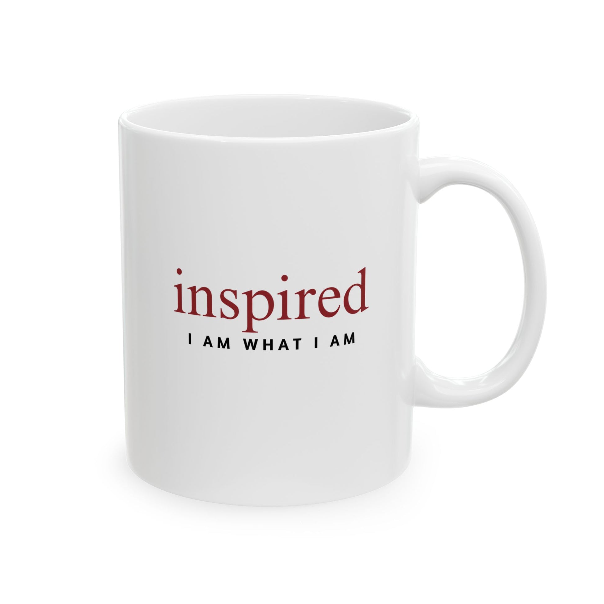White mug with 'inspired I AM WHAT I AM' text on a white background